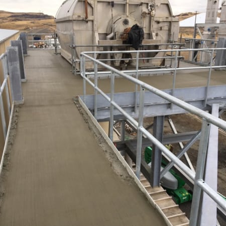 Elevated concrete slab on deck