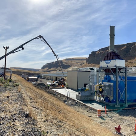Concrete pump pouring a concrete slab