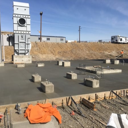 Concrete slab with anchor bolts