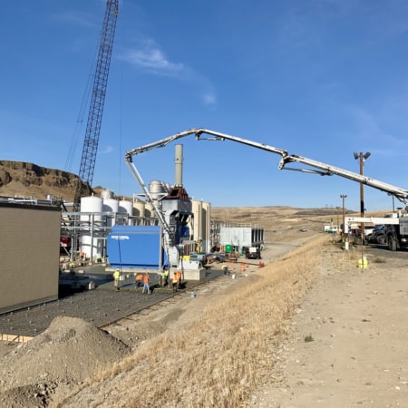 Concrete pump at processing plant