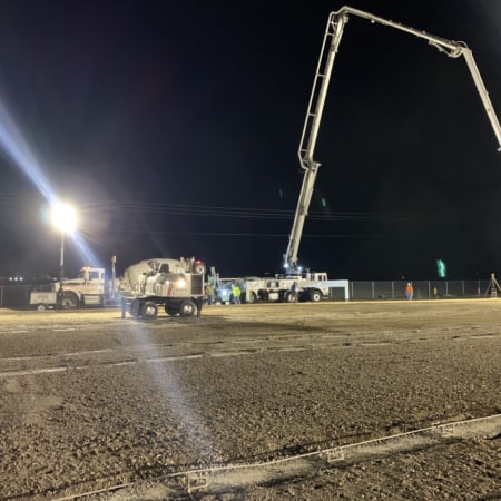 Concrete pump and laser screed