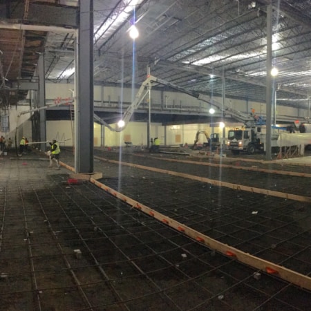 Interior concrete slabs for fruit processing facility