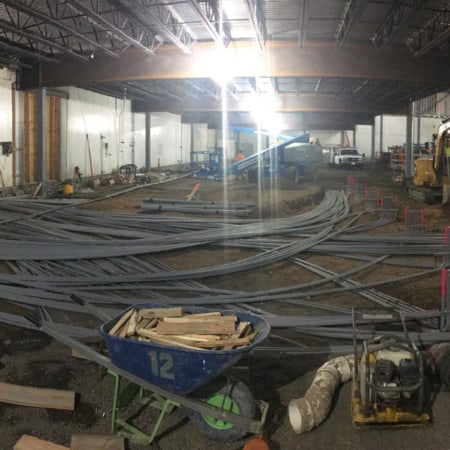 Interior concrete slabs for fruit processing facility