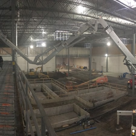 Interior concrete slabs for fruit processing facility