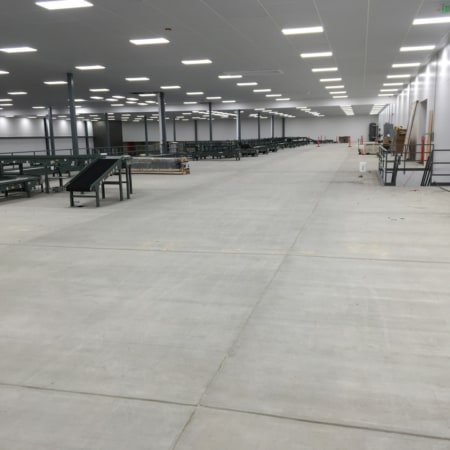Interior concrete slab at fruit processing facility