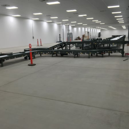 Interior concrete slab for fruit processing facility