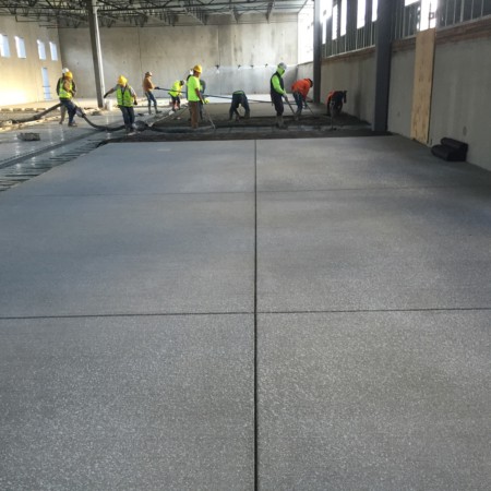 Interior concrete slabs for fruit processing facility