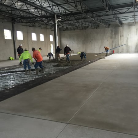 Interior concrete slabs for fruit processing facility